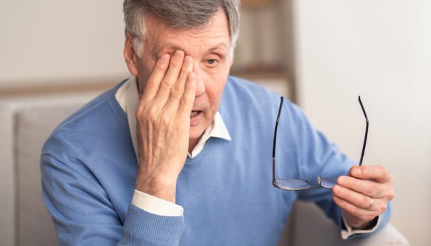 Glaucoma.,Tired,Elderly,Man,Massaging,Eye,Holding,Eyeglasses,Having,Eyestrain