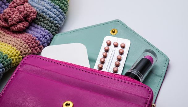 Oral,Contraceptive,Pills,In,Pink,Purse,,Blisters,Of,Birth,Control